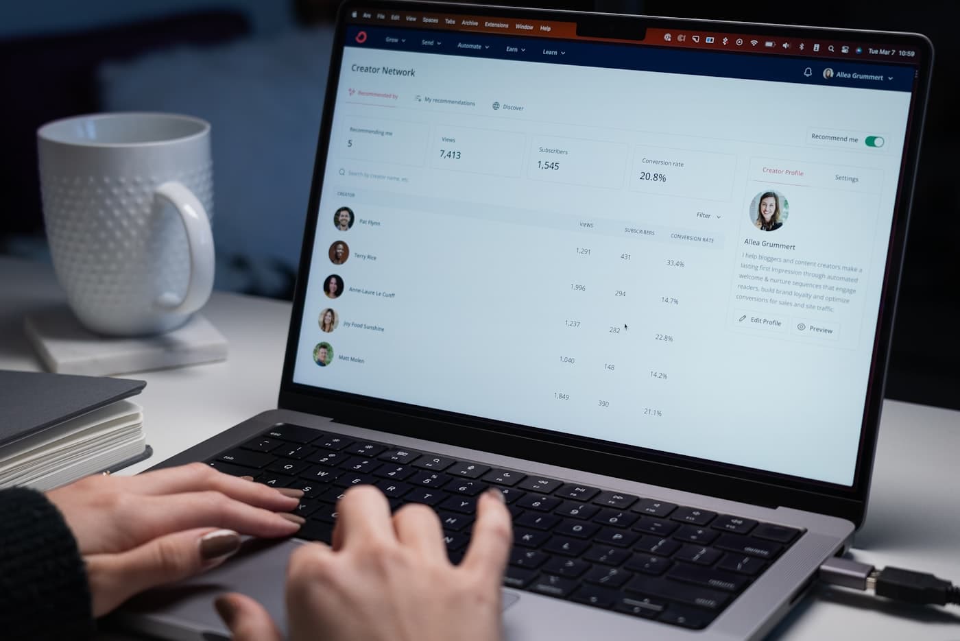 A CRM dashboard open on a laptop
